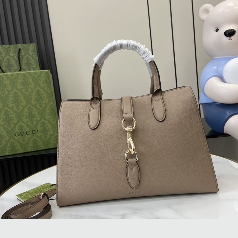 G*u*i top handle bags